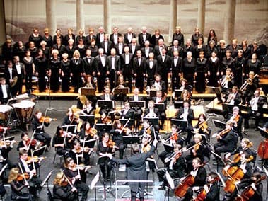 Aerial view of a stage looking down on an orchestra.